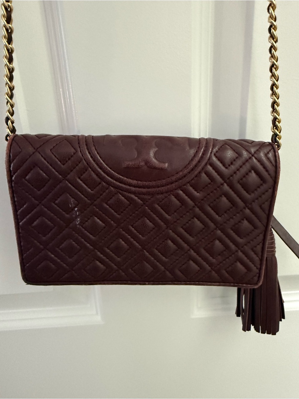 Tory Burch Fleming burgundy quilted leather wallet crossbody